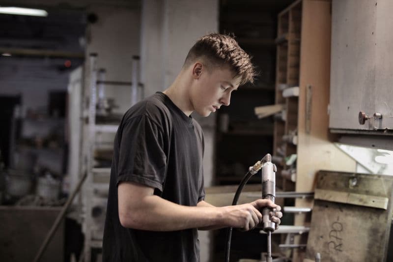 Mechanic performing light auto repair